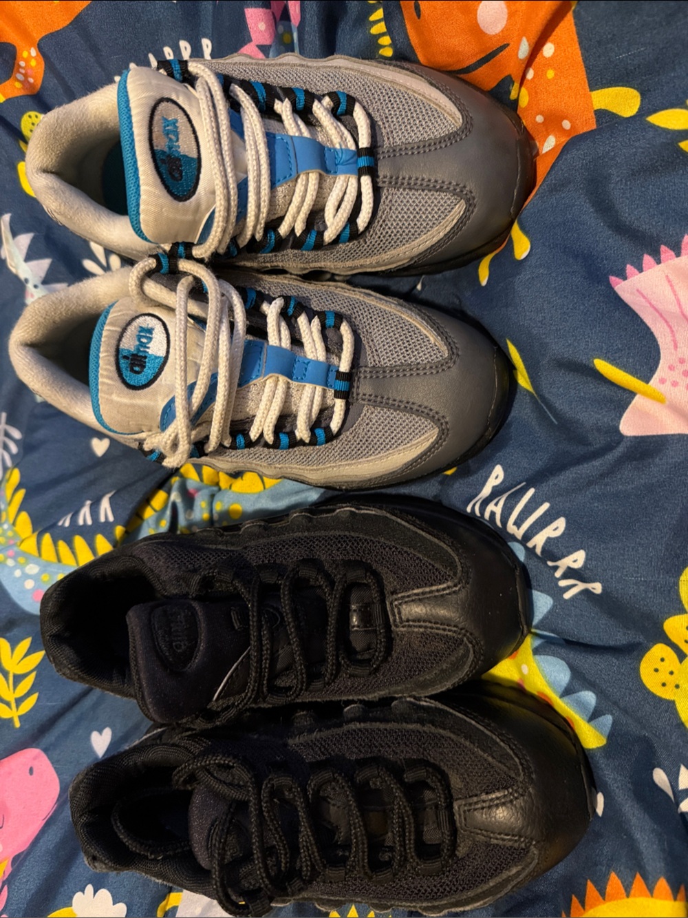 Nike Kids Sneakers in Black and Gray with Blue Accents